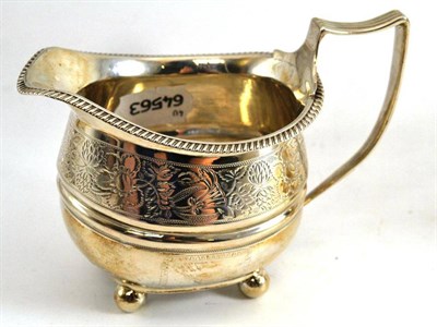 Lot 568 - A George III silver cream jug, worn marks