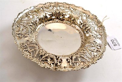 Lot 570 - An American silver pierced and embossed dish