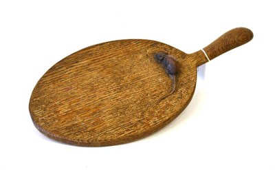 Lot 937 - A Robert  "Mouseman " Thompson Oak Cheese Board, with carved mouse signature on the board, 37cm