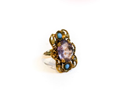 Lot 170 - An adapted purple and blue stone ring, finger...