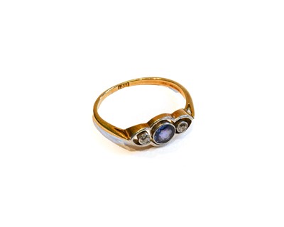 Lot 171 - A sapphire and diamond three stone ring,...
