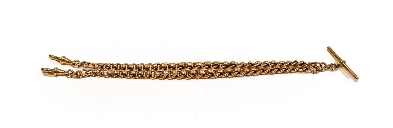 Lot 173 - An albert chain with attached T-bar, stamped...