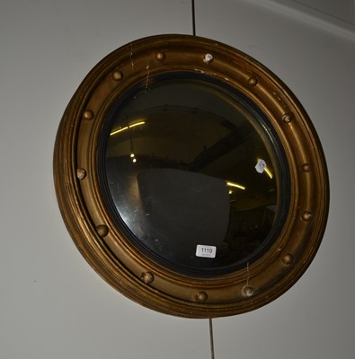 Lot 1119 - A Regency gilt framed convex mirror with...