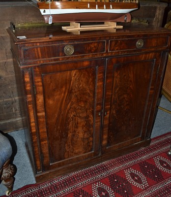 Lot 1081 - A 19th century mahogany two-door cabinet with...