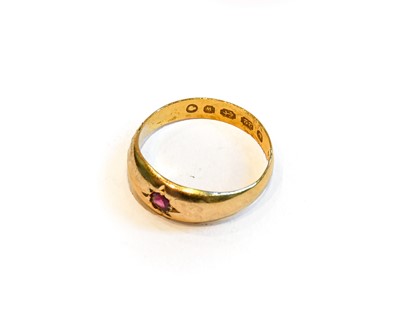 Lot 196 - A 22 carat gold synthetic ruby ring, finger...