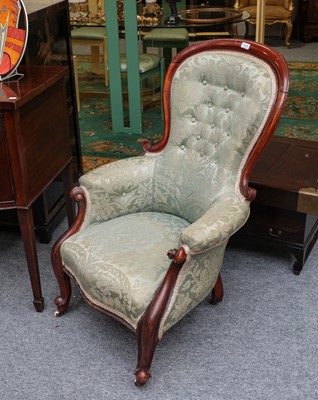 Lot 1184 - A Victorian carved mahogany button-back chair