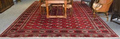 Lot 1126 - An Afghan-Turkman carpet, the raspberry field...