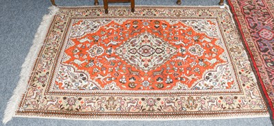 Lot 1128 - A Tabriz rug, the satsuma field with animals...