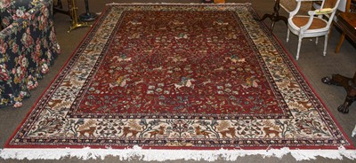 Lot 1132 - A signed Indian carpet, fox brown field witha...