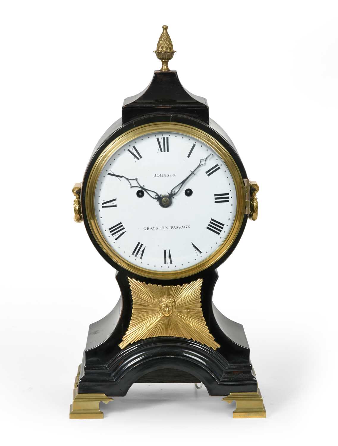 Lot 147 - A Balloon Shaped Striking Table Clock, signed...