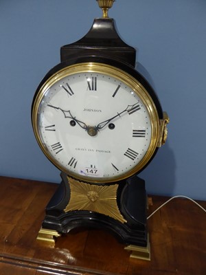 Lot 147 - A Balloon Shaped Striking Table Clock, signed...