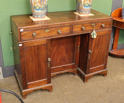 Lot 1338 - A 19th century mahogany kneehole desk, 121cm...