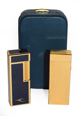 Lot 409 - A Cased Gold Plated Dunhill Lighter, of...