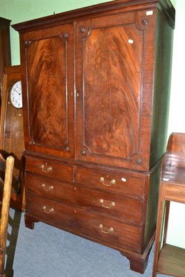 Lot 658 - Mahogany press cupboard