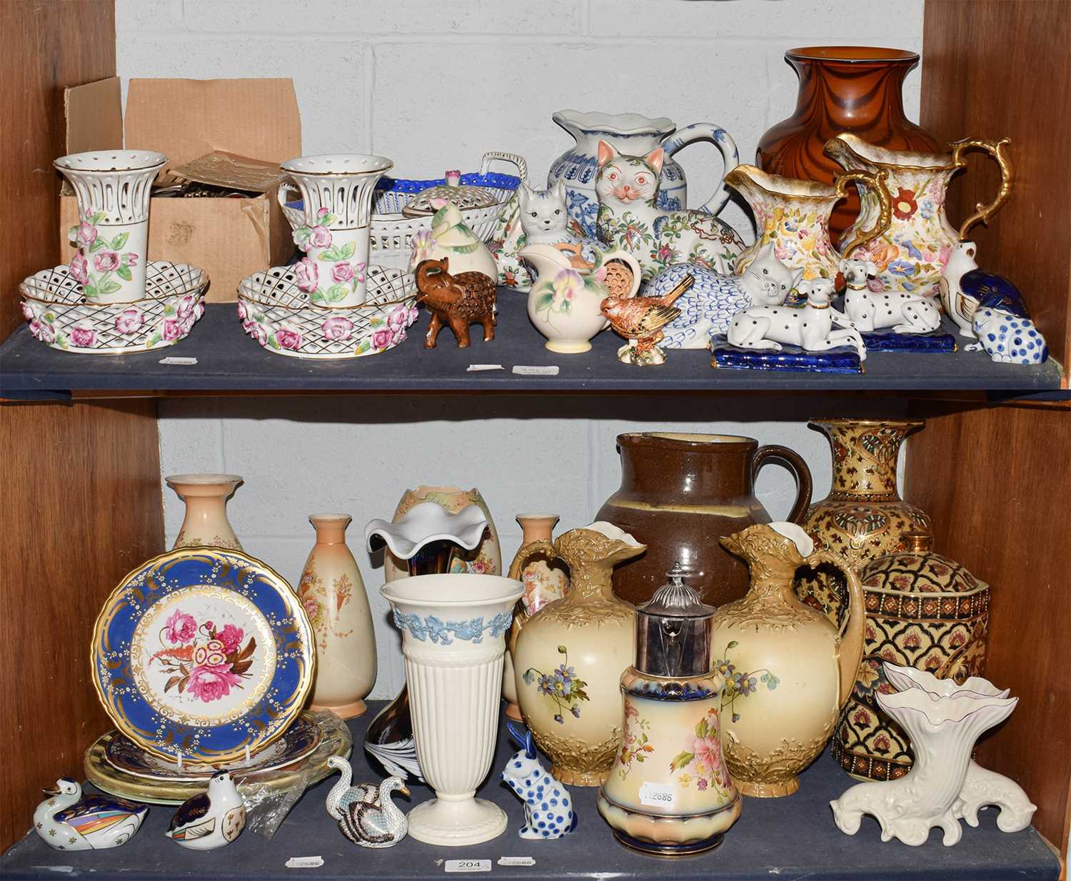 Lot 204 A quantity of decorative ceramics, glass,