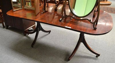 Lot 676 - A Regency mahogany pedestal dining table