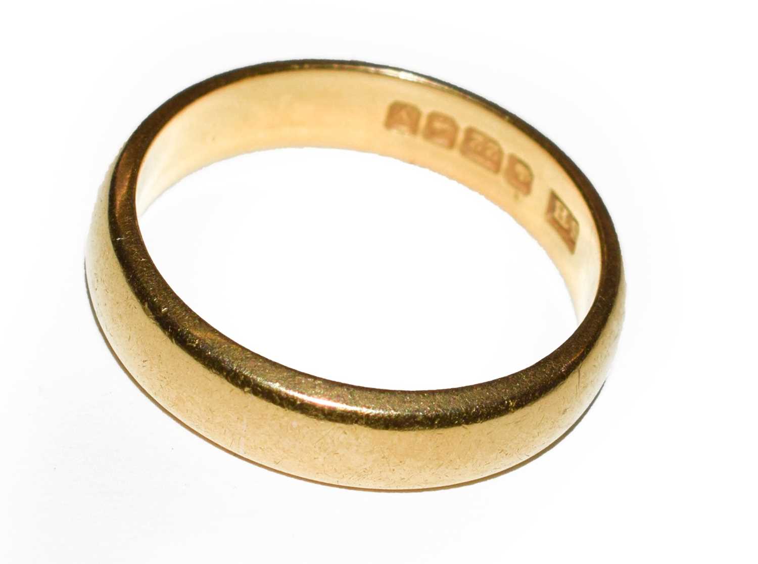 Lot 68 - A 22 carat gold band ring, finger size L1/2