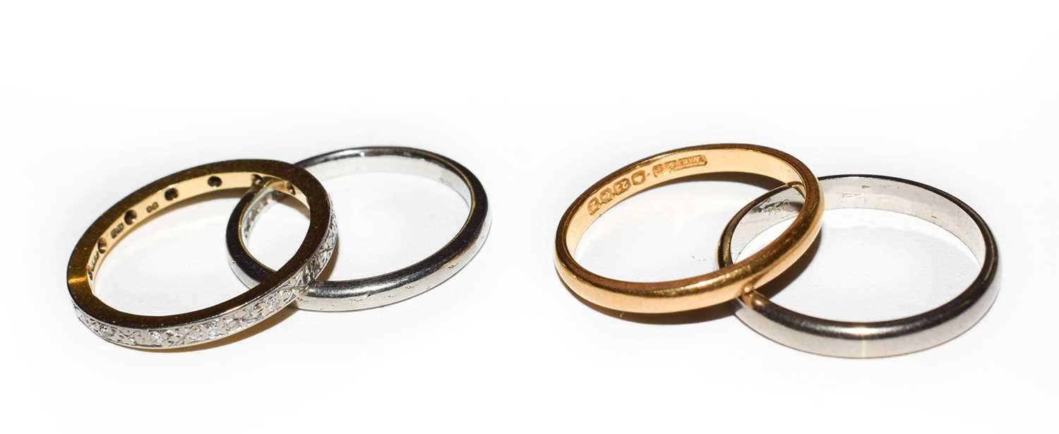 Lot 67 - A 22 carat gold band ring, finger size L1/2;...