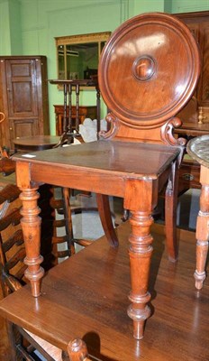 Lot 679 - A 19th century mahogany hall chair