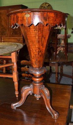 Lot 680 - A Victorian walnut sewing table