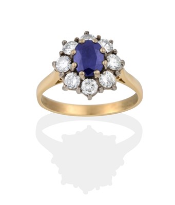 Lot 2304 - A Sapphire and Diamond Cluster Ring