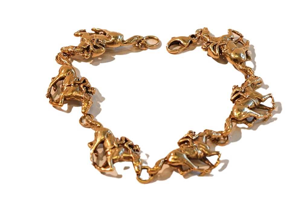 Lot 1032 A 9 carat gold horse bracelet, by Harriet