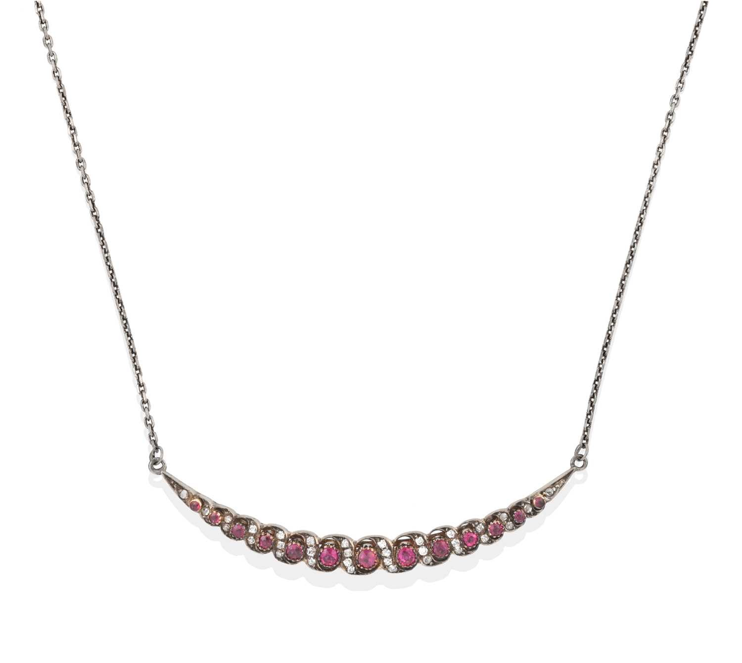 Lot 2272 - A Synthetic Ruby and Diamond Crescent Necklace