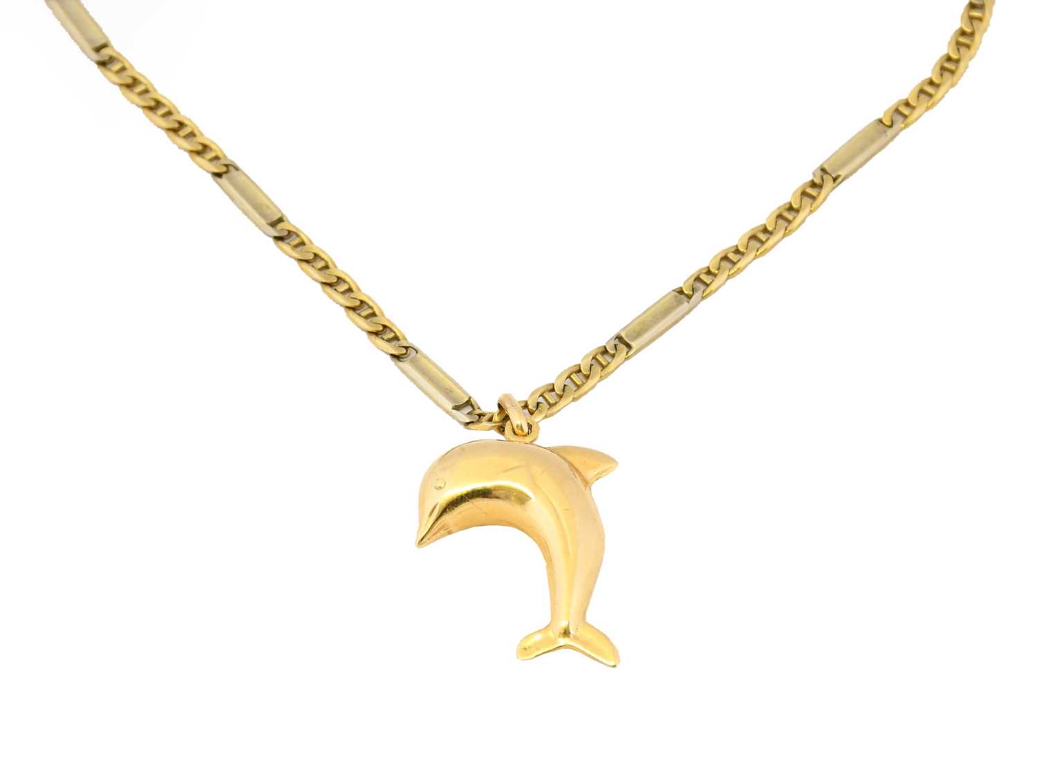 Lot 1029 - A dolphin pendant on chain, the yellow dolphin...