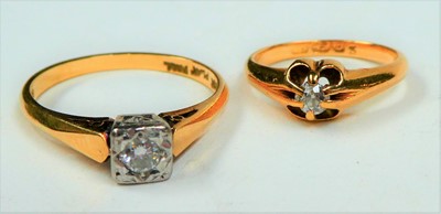 Lot 64 - An 18 carat gold diamond solitaire ring,...