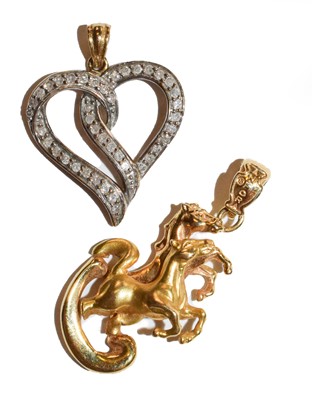 Lot 61 - A diamond heart shaped pendant, stamped '375',...