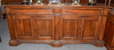 Lot 1233 - A continental walnut sideboard, 225cm by 50cm...