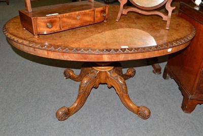 Lot 691 - A Victorian walnut loo table