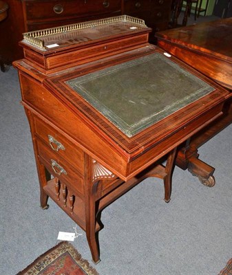 Lot 692 - A Victorian rosewood Davenport