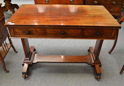 Lot 693 - A William IV mahogany library table with three drawers to the frieze