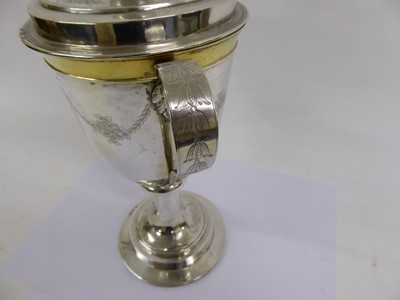 Lot 2164 - A Russian Parcel-Gilt Silver Two-Handled Cup and Cover