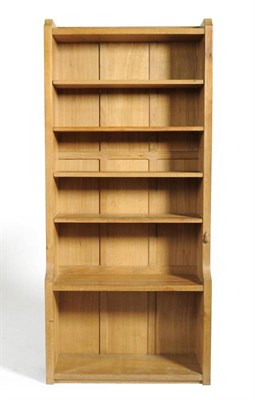 Lot 947 - A Robert  "Mouseman " Thompson Oak 6' Open Bookcase, solid ends and panelled back, raised...