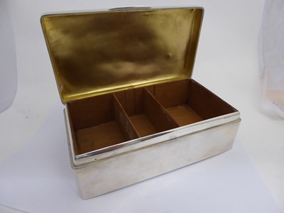 Lot 45 - A George V silver cigarette-box, by Charles...