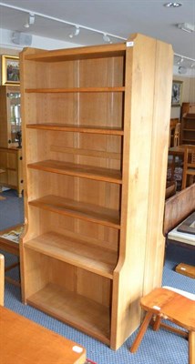 Lot 948 - A Robert  "Mouseman " Thompson Oak 6' Open Bookcase, solid ends and panelled back, raised...