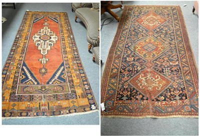 Lot 707 - A Karabagh long rug, the rust field with an ivory stepped medallion framed by spandrels and borders