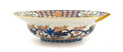 Lot 101 - ^ An Imari Porcelain Barber's Bowl, Edo period,...