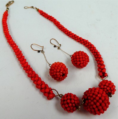 Lot 82 - A coral bead necklace, length 40cm; and a pair...