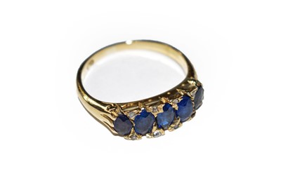 Lot 138 - A sapphire ring, the five graduated oval cut...