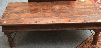 Lot 1108 - A modern carved studded coffee table 130cm by...