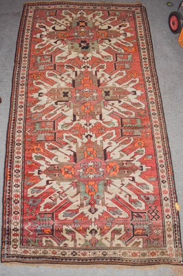 Lot 1014 - A Cheleberd rug, the brick red field with...