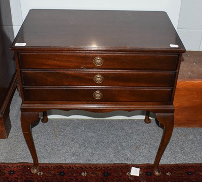 Lot 352 - A mahogany three drawer canteen table...