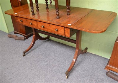 Lot 753 - George III mahogany sofa table with key