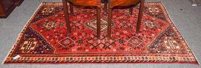 Lot 1002 - A Qashqai rug, abrash field of geometric...