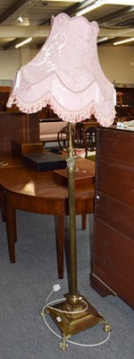 Lot 1254 - A brass Corinthian column telescopic standard...