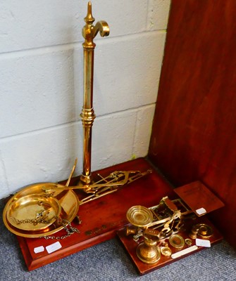 Lot 182 - Two brass scales and a quantity of brass weights