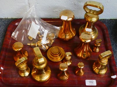 Lot 182 - Two brass scales and a quantity of brass weights